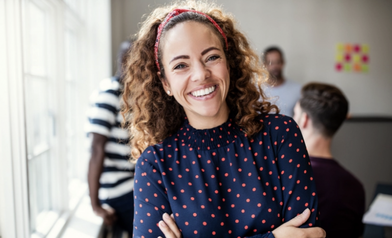 Woman smiling directly at the camera