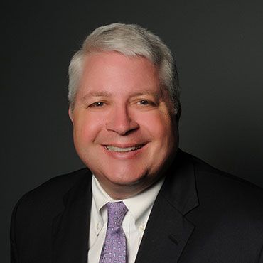 headshot of Larry Helling, QCRH & CRBT CEO 